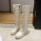 Beige kort plys