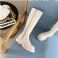 Beige kort Pels